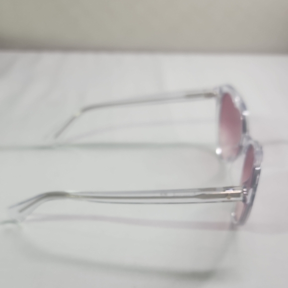 Kate Spade Heart-Shaped Sunglasses with Clear Frame and Purple Lenses - Picture 4 of 8